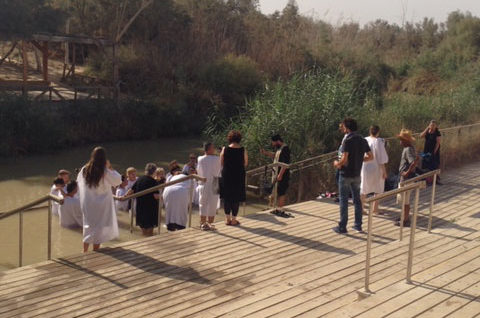 People entering the Jordan River